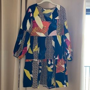 Long sleeve baby doll print dress.